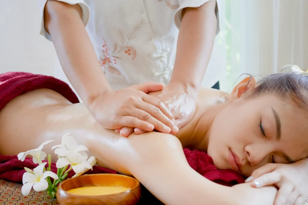 Woman receiving a full-body massage treatment at our San Francisco spa